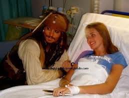 The guy in the pirate suit is worth more than the entire value of the hospital treating the girl he is visiting.